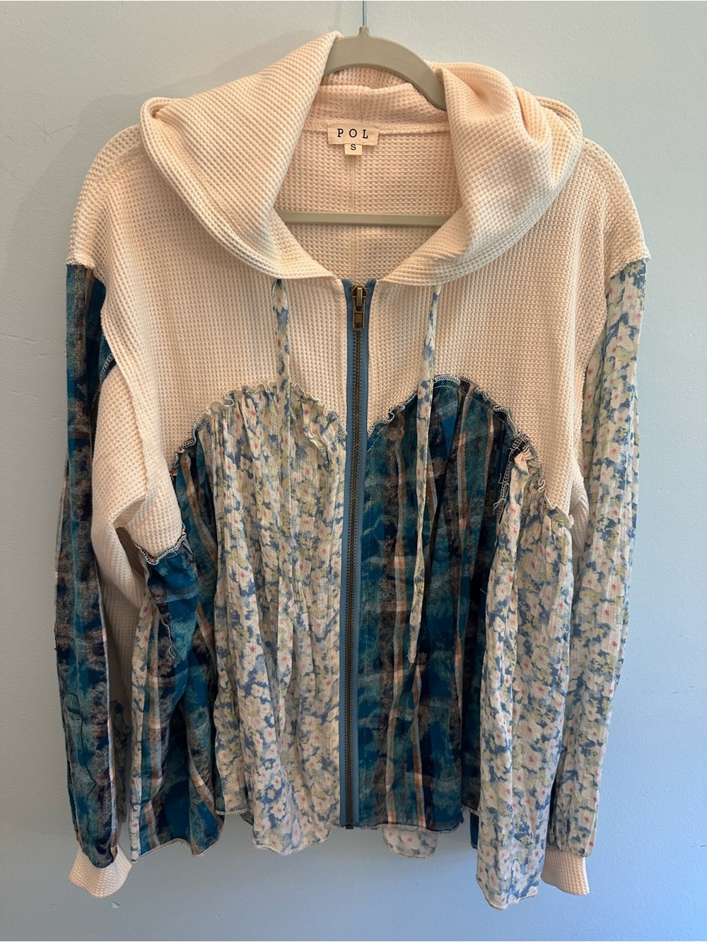 POL cream hoodie with blue and teal floral panels